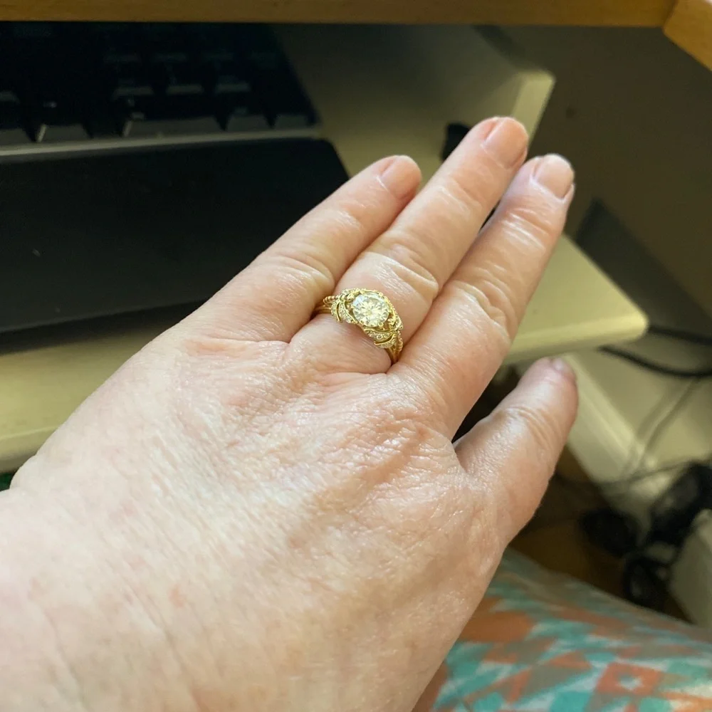 10kt yellow gold and moissanite dragonfly ring.